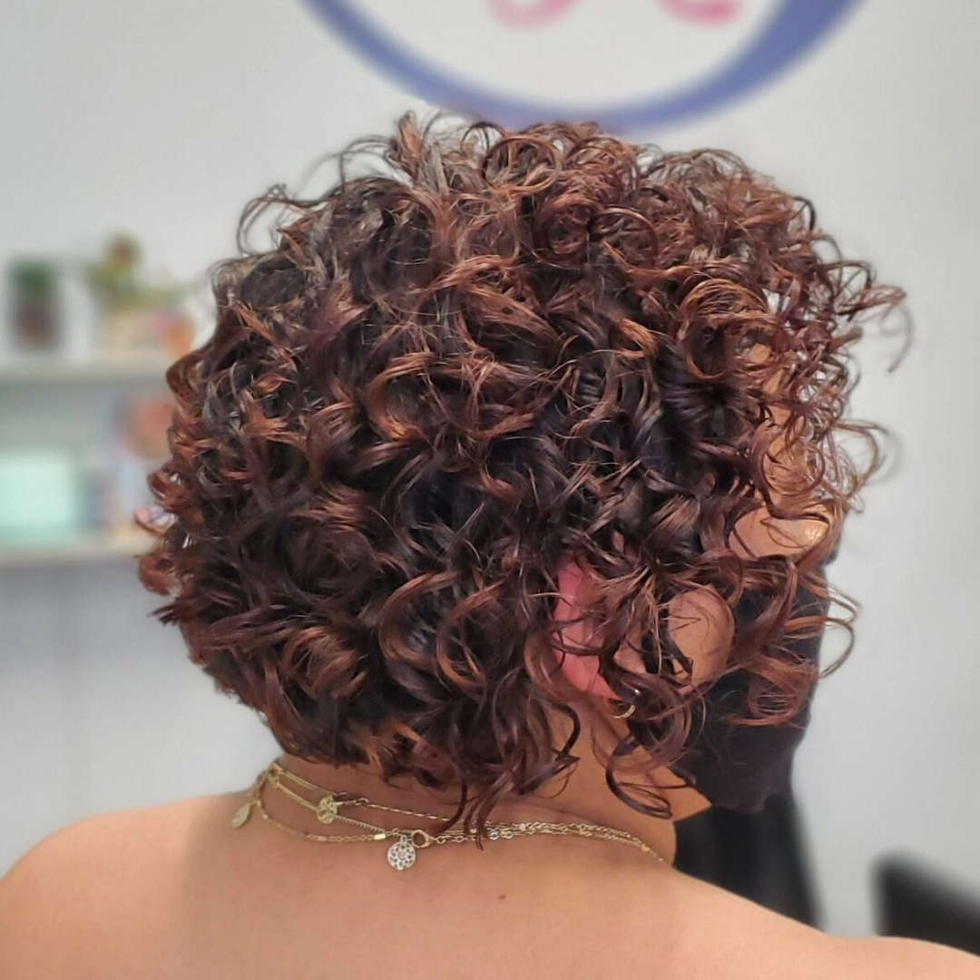 Defined frizz-free curly hair in humid New Orleans weather - natural frizz reduction tips - Wicked Hues